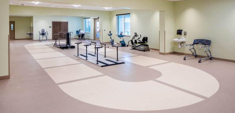 Interior view of a fitness room with exercise equipment