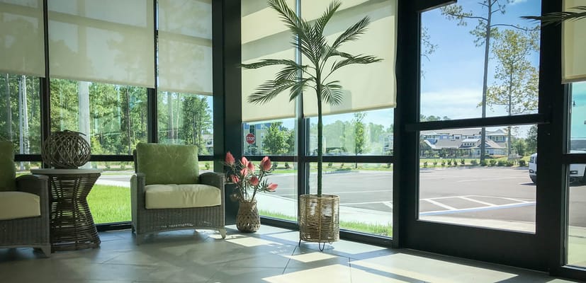 Bright interior view with seating area and large windows