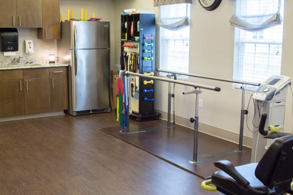 Rehabilitation space with therapy equipment and aids