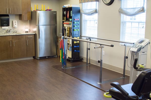 Rehabilitation space with therapy equipment and aids