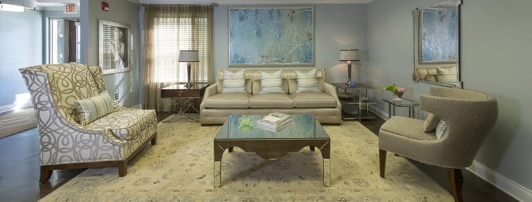 Stylish common area with comfortable seating and artwork