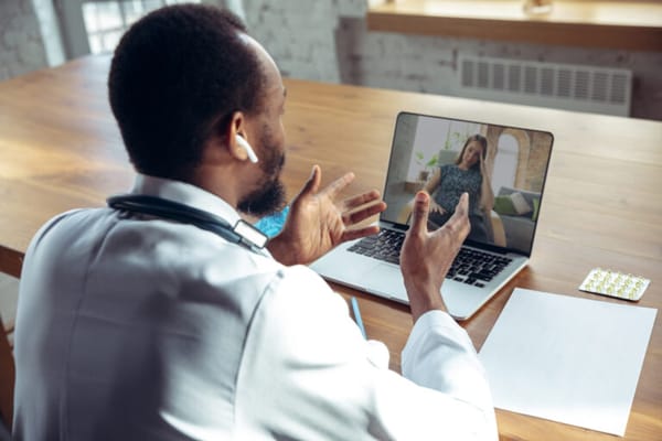 A doctor conducting a telehealth consultation
