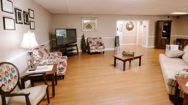 Common area lounge with seating and decor