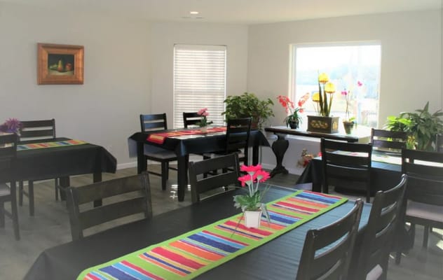 Bright dining room with colorful table settings