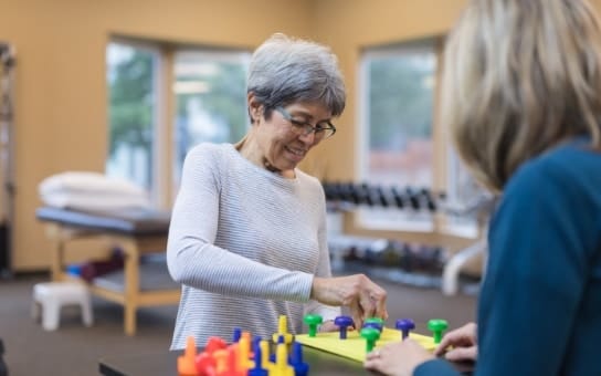 Residents engaging in a recreational activity indoors