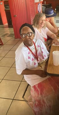 Residents enjoying an activity together in an interior space