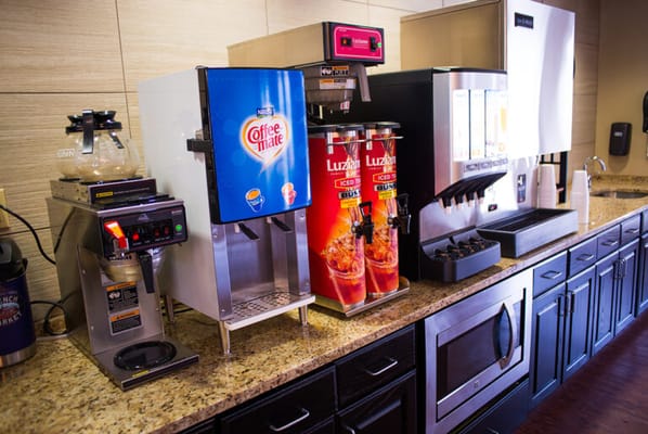 Drink station with coffee and beverage dispensers
