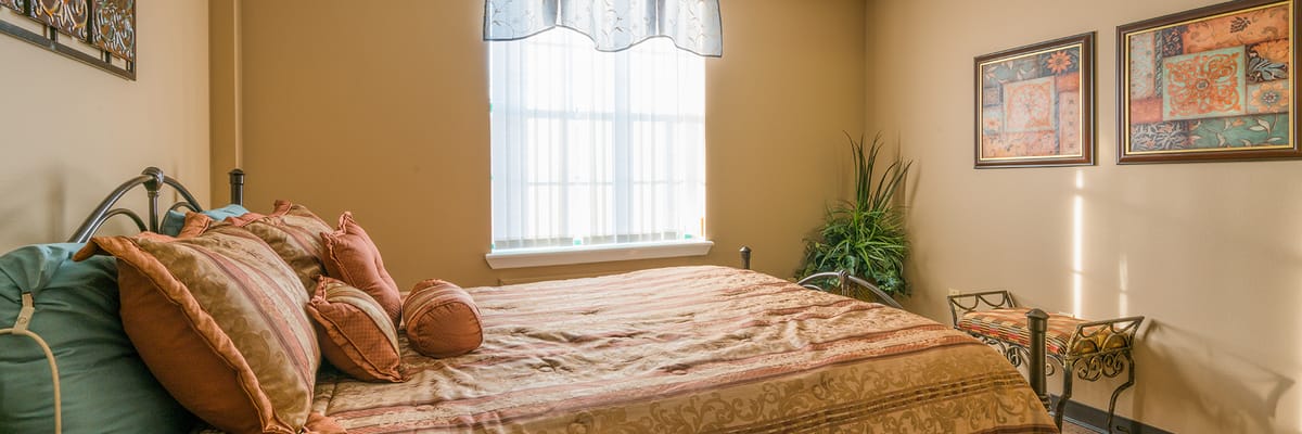A well-decorated resident bedroom with floral accents