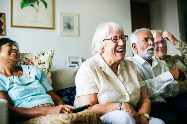 Residents enjoying a lively moment in a common area