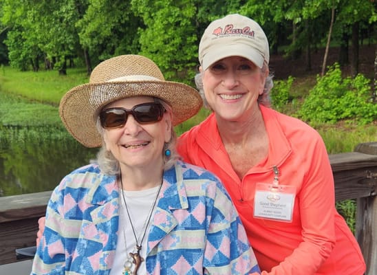 Resident and staff member enjoying time outdoors
