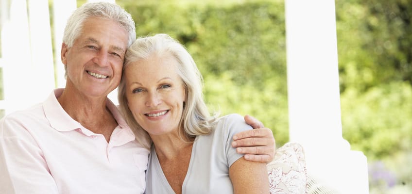 Happy senior couple enjoying an outdoor space
