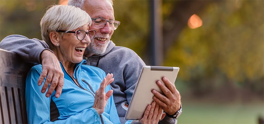 Happy senior couple enjoying time together outdoors