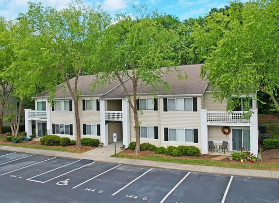 Exterior view of Crescent Oaks facility with accessible parking
