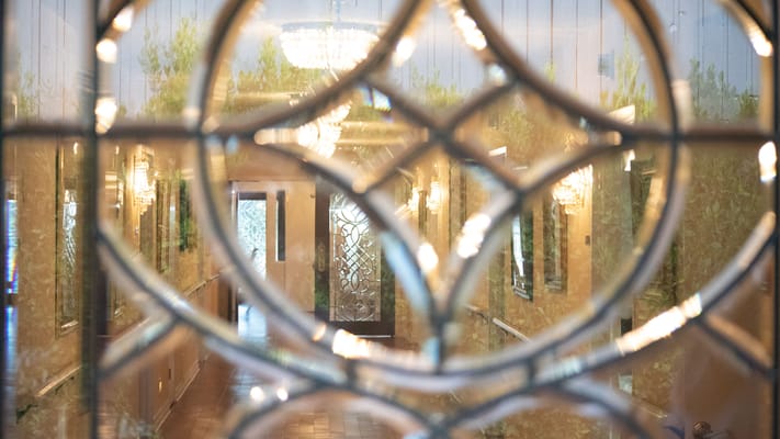 Interior hallway with decorative glass design