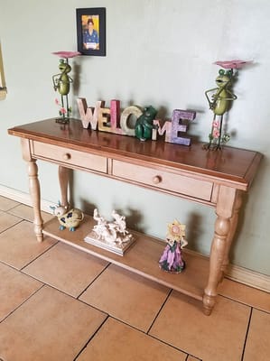 Welcoming decor in a common area with a wooden table