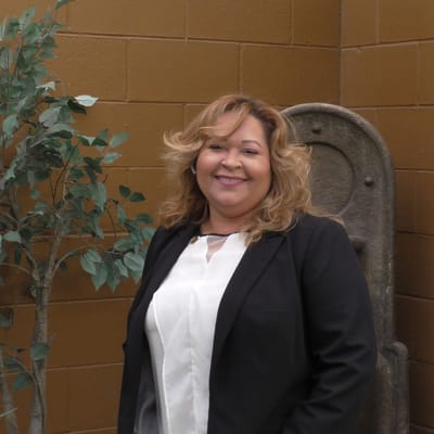 Staff member smiling in facility