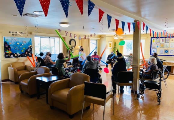 Residents participating in an engaging indoor activity