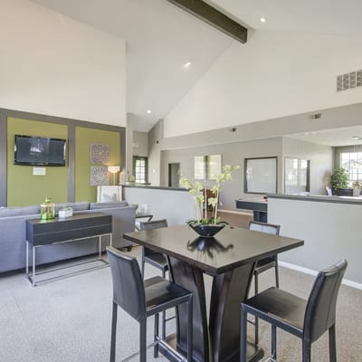 A bright common area with seating and decor