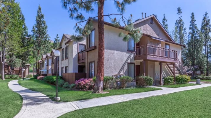 Exterior view of Emerald Court with landscaped grounds