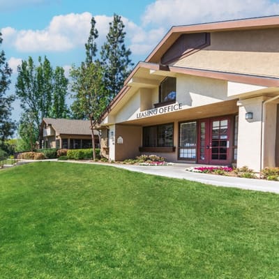 Exterior view of a leasing office at Emerald Court