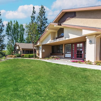Exterior view of a leasing office at Emerald Court