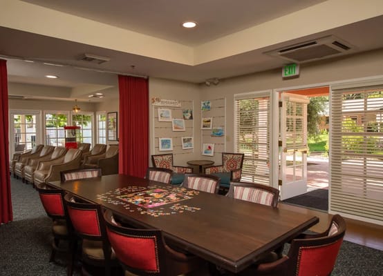 Common area with a large table and seating