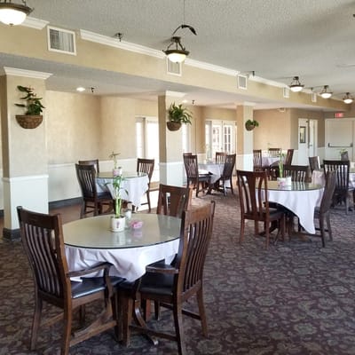 Dining room with tables set for meals