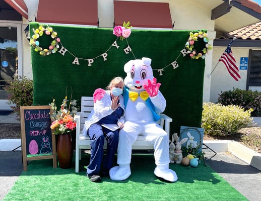 Resident and staff member celebrating Easter outside