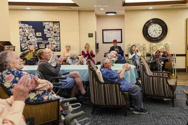 Residents enjoying an event in a common area