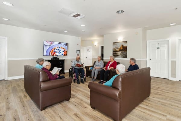 Residents engaged in a group activity in a common area