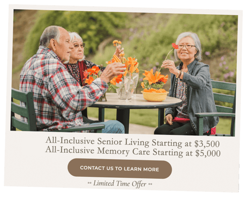 Residents enjoying flowers at an outdoor table
