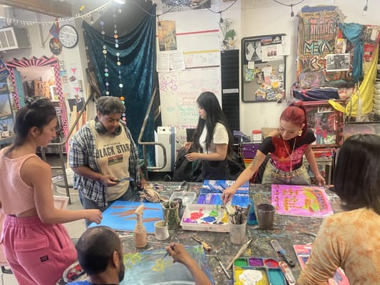 Residents engaged in an art activity together