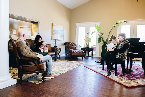 Residents and visitors interacting in a cozy common area
