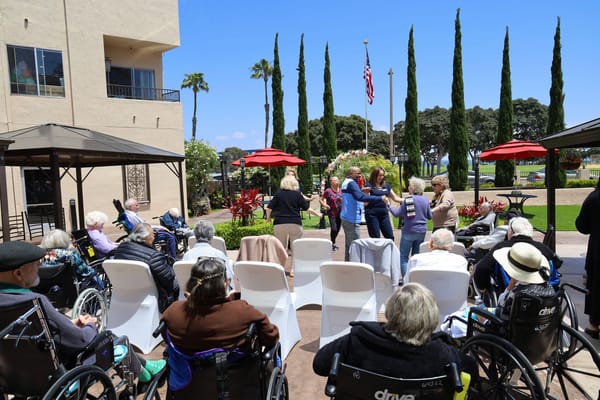 Residents participating in an outdoor activity at the facility