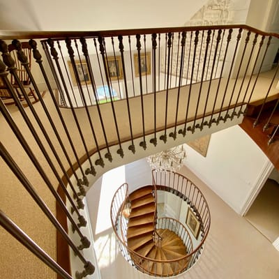 View of a spiral staircase with decorative railing