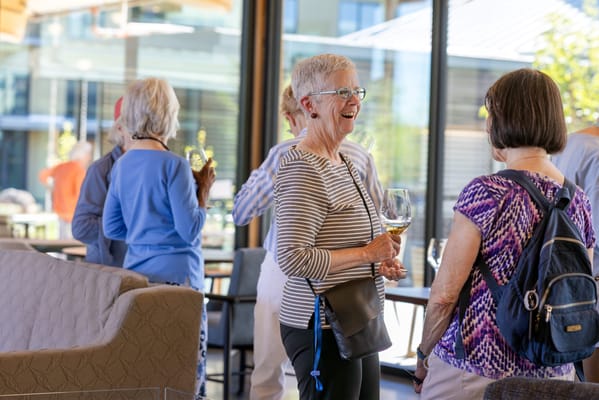 Residents enjoying a gathering in a common area
