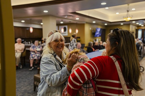 Residents enjoying an activity in a common area