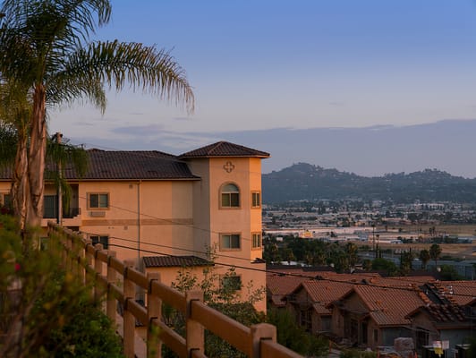 Exterior view of the facility with surrounding landscape