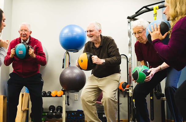 Residents participating in a group exercise class