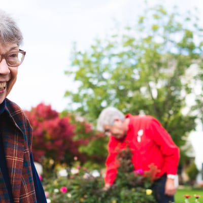 Residents participating in gardening activity outdoors