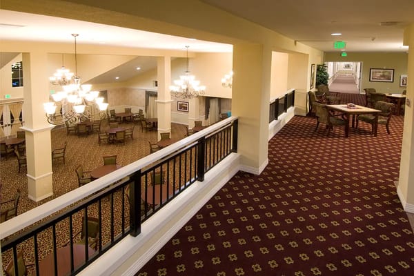 Bright common area with tables and seating