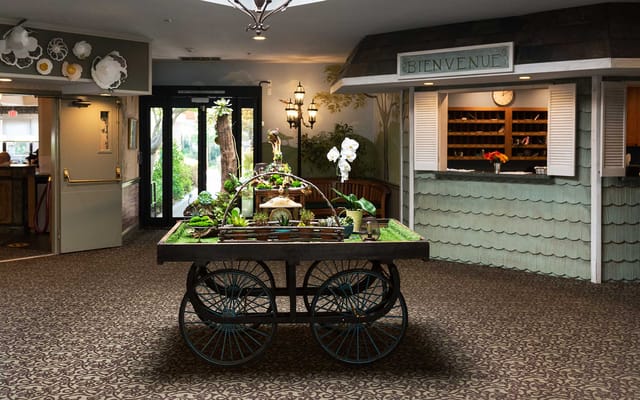 Welcoming interior common area with decorative cart