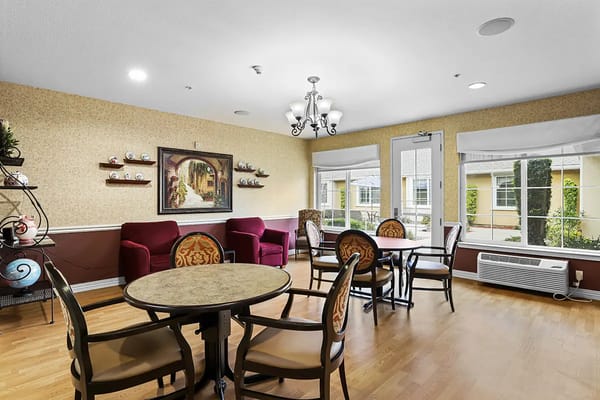 Bright common area with seating and artwork