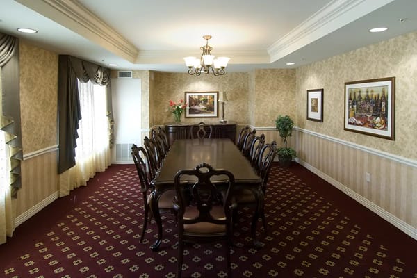 Interior view of a dining area with a long table