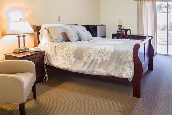 Cozy resident room with a bed and furniture