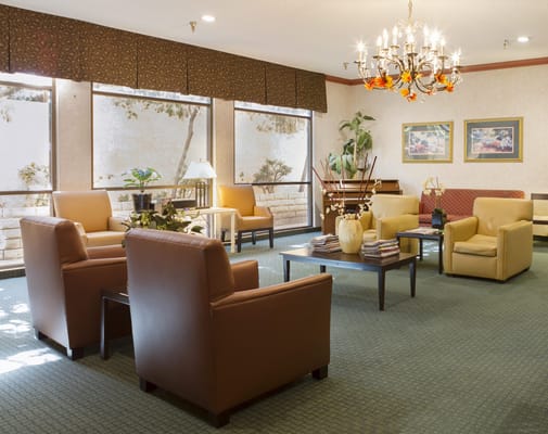Cozy common area with seating and natural light