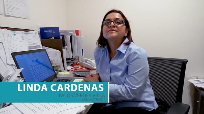 Administrator Linda Cardenas at her desk in the facility.