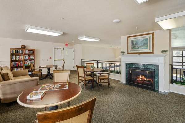 Cozy common area with seating and puzzle activities