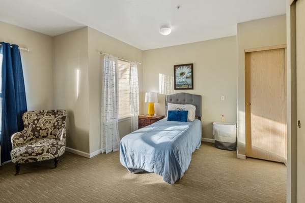 Well-furnished resident room with personal touches