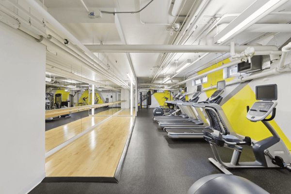 Interior view of a fitness room with exercise equipment